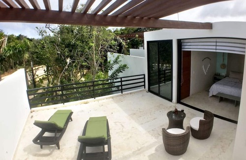 Akumal Casa | My Eco Chic OM Sanctuary con playa, piscinas y club de golf.