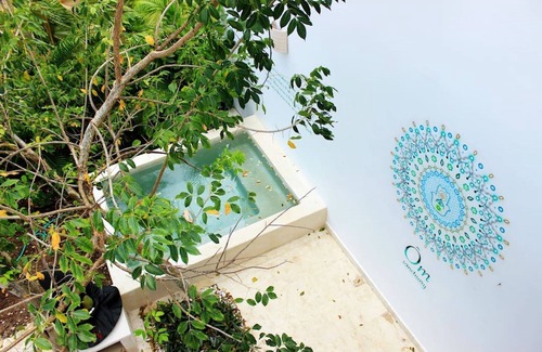 Akumal Casa | My Eco Chic OM Sanctuary con playa, piscinas y club de golf.