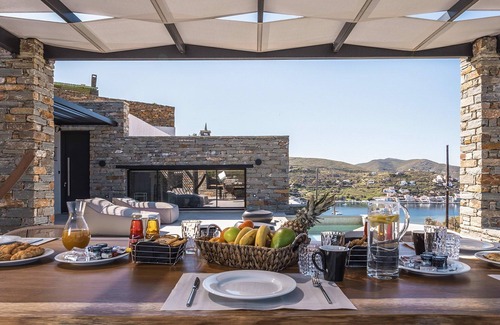 Vourkari Villa | My Rental Homes - Villa Kronos with lounge area and a heated Jacuzzi-plunge pool.