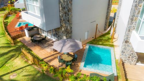 Passo de Camaragibe Casa | Naluum Residence - Paraíso Pé na Areia em Milagres com Conforto e Lazer!