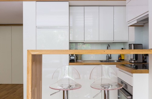 Quartier de la Monnaie Apartamento | Entresuelo 1BR contemporáneo con minutos de jardín de Notre-Dame, por Veeve