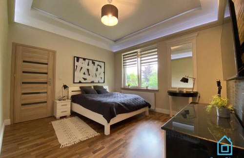 Szemud Apartamento | NaWypasie Apartment with Sauna Beautiful Garden SUP Board and Just 30 Minutes from Gdańsk and Gdynia