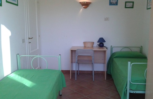 Porto San Paolo Casa | Cerca del mar - apartamento de tres habitaciones con gran jardín en el BORGO de Porto San Paolo