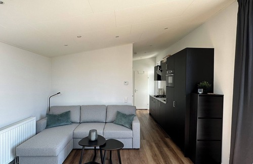 Lathum Chalet De Esquí | Near the lake: Modern chalet in vacation park "De Veerstal" - child-friendly!