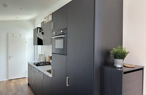 Lathum Chalet De Esquí | Near the lake: Modern chalet in vacation park "De Veerstal" - child-friendly!