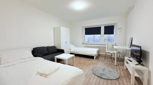 Neumuenster Apartamento | Neumünster Apartments direkt an der Stadthalle mit WLAN & Parkplatz
