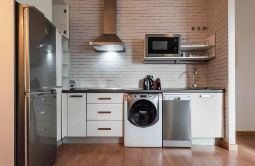 La Merced Apartamento | Nuevo apartamento de 1 dormitorio en el centro de Málaga con aparcamiento y piscina en la azotea