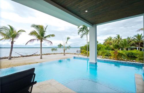 Placencia Villa | NEW 3 Story Waterfront 4Bedroom Villa with Amazing Sunset Mountain Views