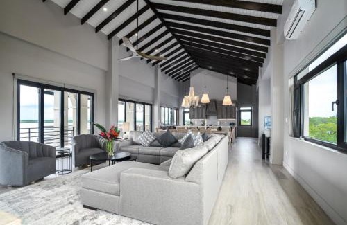 Placencia Villa | NEW 3 Story Waterfront 4Bedroom Villa with Amazing Sunset Mountain Views