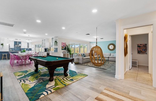 Villages of Palm Beach Lakes Casa | NEW 6BR Beach Resort-Style Game House! Heated Pool