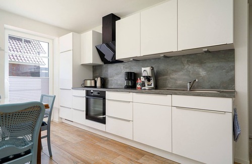 Eilsum Apartamento | New 72sqm apartment for 4 people with terrace right on the waterfront