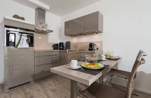 Norderney Apartamento | Apartamento nuevo, mobiliario de marca en un diseño moderno en un nivel de 5 *