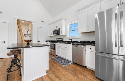 Carova Beach Cabaña | New CANAL front home a few rows back from the OCEAN! Beach passes provided!