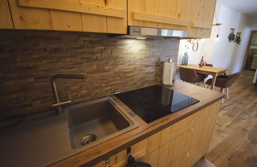 Bischofsheim an der Rhon Apartamento | New, cozy vacation apartment directly on the Haselbach