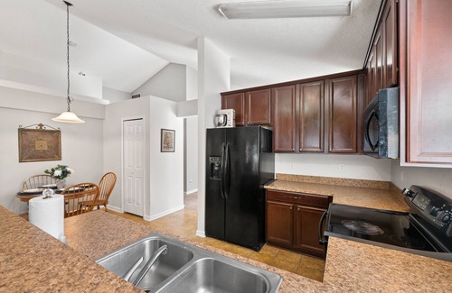 Northside Casa | NEW! Cozy home w fire pit, minutes from airport! Foosball table & so much more!