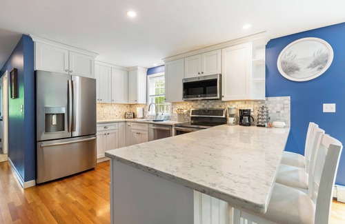 Mashpee Casa | NEW! Cozy Retreat w/ Firepit, Large Yard & Game Room – Pool Table & Foosball!