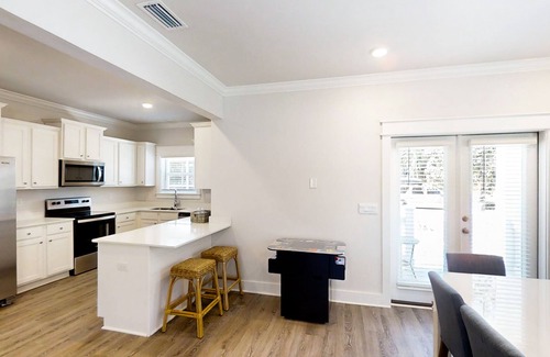 Carrabelle Casa | New dog-friendly home near beach & golf with pool, arcade game, decks, W/D, AC