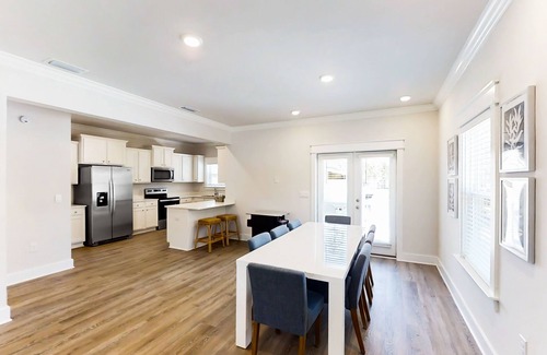 Carrabelle Casa | New dog-friendly home near beach & golf with pool, arcade game, decks, W/D, AC