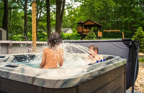 Pocono Summit Casa | NEW! Dream House- Heated Salt Pool, Hot Tub, Game Room, Lake Access