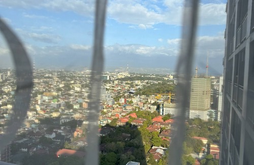 Santo Cristo Condominio | New GRASS residence condo near SM North EDSA modern, POOL, Home Away from Home