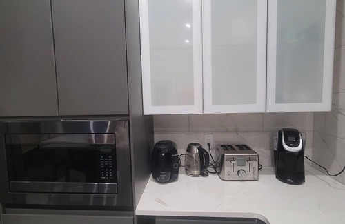 Val-des-Monts Villa | NEW! Lakefront Paradise: Spacious 5-Bedroom Retreat with Hot Tub Bliss