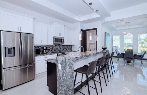 Burnt Store Villa | New listing - Amazing new 3beds/3baths Gulf access villa w. heated pool and outdoor kitchen!