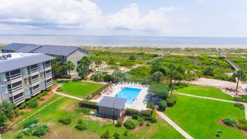 Oceanmarsh Subdivision Casa | NEW LISTING! Centrally Located with Pool and Beach Views