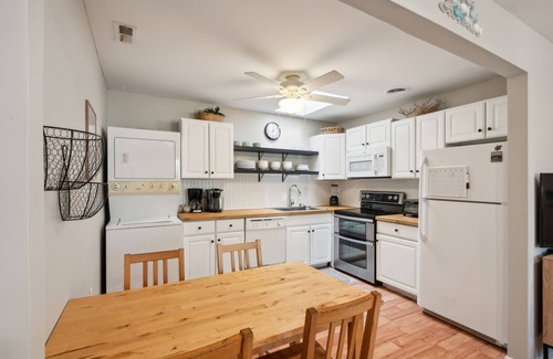 Village Green Condominio | NEW LISTING! Cozy 2BR Condo - Beachside Bliss with Yard Space