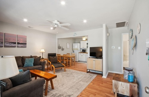 Village Green Condominio | NEW LISTING! Cozy 2BR Condo - Beachside Bliss with Yard Space