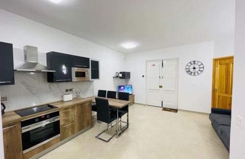 Ghajnsielem Apartamento | New, Modern Ground Floor Apartment with Pool