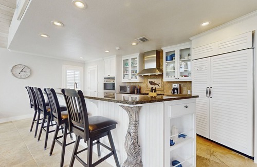 Key Allegro Casa | New Ownership - Canal-front home with pool, pool spa, kayaks, dock, & casita
