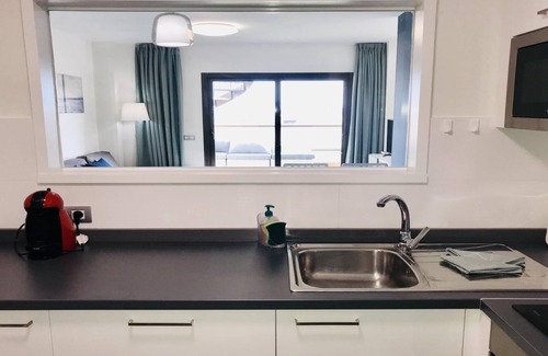 Caleta de Fuste Apartamento | Ático nuevo con vistas al mar y al campo de golf