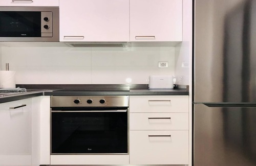 Caleta de Fuste Apartamento | Ático nuevo con vistas al mar y al campo de golf