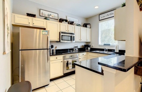 Kissimmee Casa | NEW! Relaxing Townhome Near Disney w/Pool, Spa, & Resort Amenities