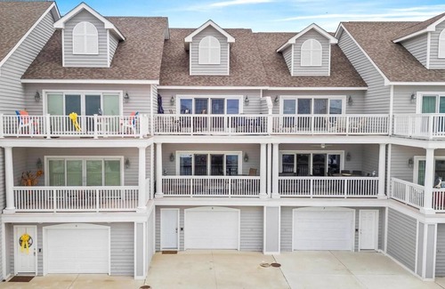 Bethany Beach Casa | NEW: Spacious 4-BR townhome with marina & bay views, pool and easy beach access.
