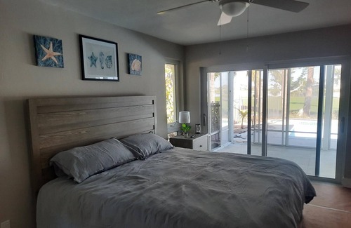 The Dunes Casa | Newly renovated 2024. Located on golf course with a lake view and pool.