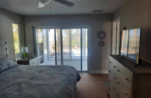 The Dunes Casa | Newly renovated 2024. Located on golf course with a lake view and pool.