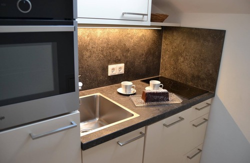 Radstadt Apartamento | Apartamento vacacional Elisabeth recién renovado con piscina compartida, vistas a la montaña y WiFi