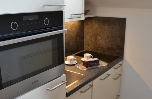 Radstadt Apartamento | Apartamento vacacional Elisabeth recién renovado con piscina compartida, vistas a la montaña y WiFi