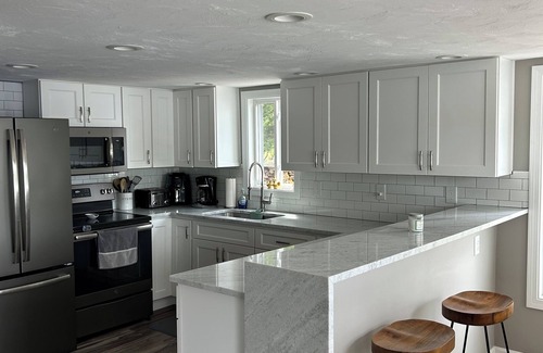 Fitzwilliam Casa | Newly renovated lake front home with dock and sunset views of Laurel Lake