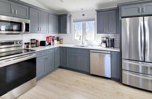 Silver Beach Casa | Newly Renovated 3BD--Central A/C, Enclosed Outdoor Shower, Bike or Walk to New Silver Beach, Only 0.5 Mi