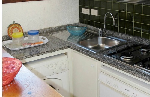Santa Reparata Apartamento | Precioso apartamento para 6 personas con piscina, TV, balcón, mascotas permitida y aparcamiento