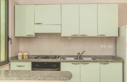 Costa Rei Apartamento | Acogedor apartamento para 4 personas con A/C, piscina, terraza, mascotas permitida y aparcamiento