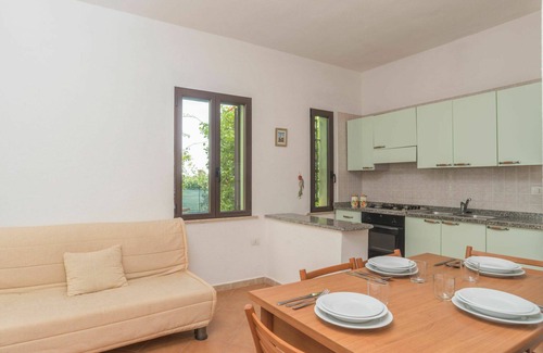 Costa Rei Apartamento | Acogedor apartamento para 4 personas con A/C, piscina, terraza, mascotas permitida y aparcamiento