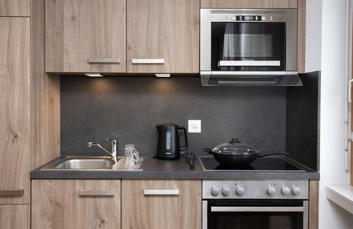 Falera Apartamento | Hermoso apartamento para 6 personas con piscina, WIFI, TV, balcón, vista panorámica y aparcamiento