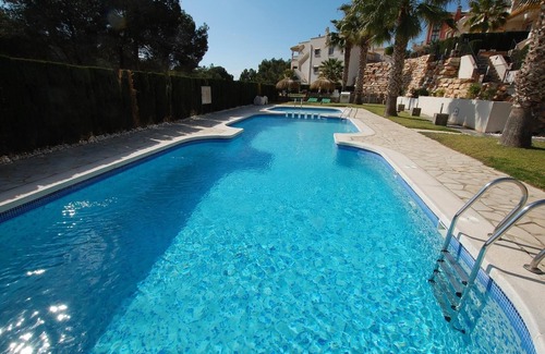Orihuela Costa Apartamento | Bonito apartamento en una zona maravillosa con piscina compartida y Wi-Fi