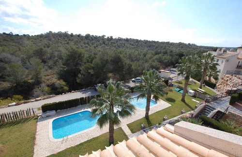Orihuela Costa Apartamento | Bonito apartamento en una zona maravillosa con piscina compartida y Wi-Fi