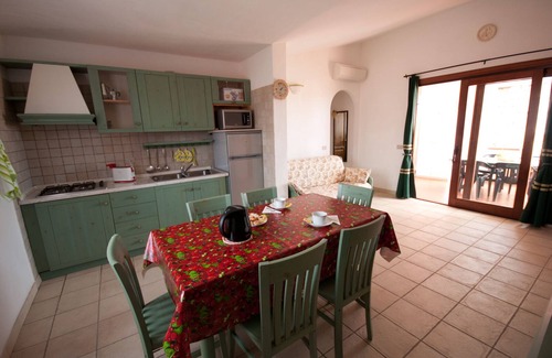 Monte Petrosu Apartamento | San Teodoro:Precioso apartamento con azotea en elegante residencia con piscina