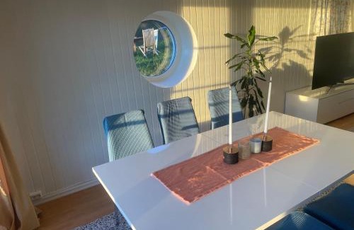 Oslo Apartamento | Nice Family Friendly apartment 2 bed Rooms with sea view located in Nordstrand for 5 guests with a garden and grill with sea view just beside the apartment