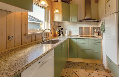 Hasmark Strand Casa | Bonita casa en Otterup con cocina.